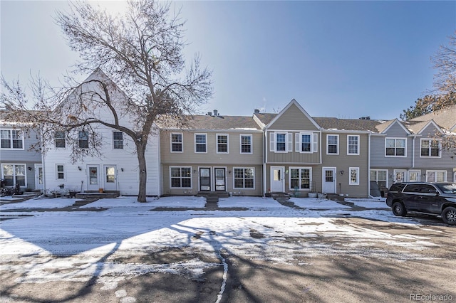 townhome / multi-family property featuring entry steps