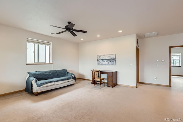 living area with baseboards, recessed lighting, visible vents, and carpet