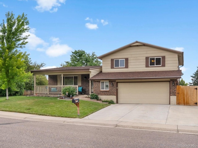 6166 S Dover St, Littleton, CO 80123 - tri-level home with covered porch, brick siding, concrete driveway, an attached garage, and a shingled roof