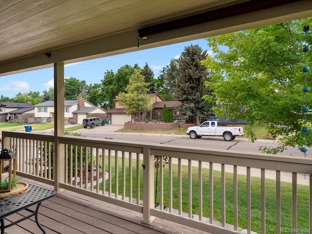 6166 S Dover St, Littleton, CO 80123 - wooden deck with a residential view and a lawn