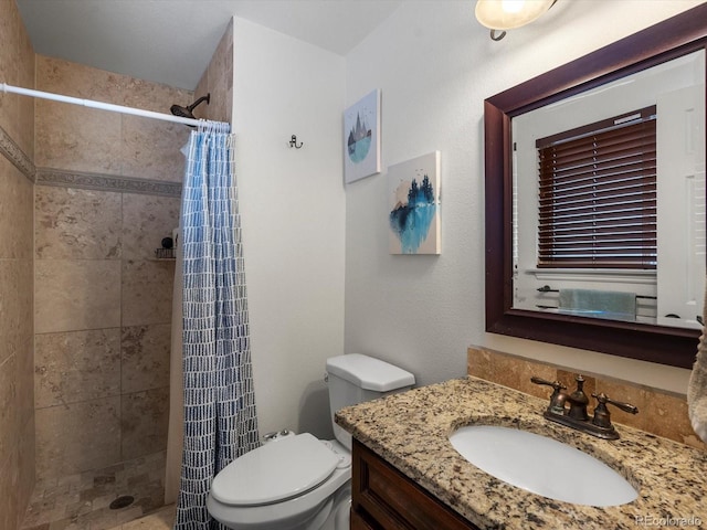 6166 S Dover St, Littleton, CO 80123 - bathroom with vanity and a tile shower