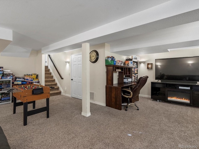 6166 S Dover St, Littleton, CO 80123 - home office featuring carpet flooring and a glass covered fireplace