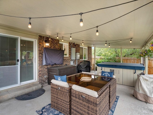 6166 S Dover St, Littleton, CO 80123 - view of patio / terrace with a hot tub, outdoor dining area, and area for grilling