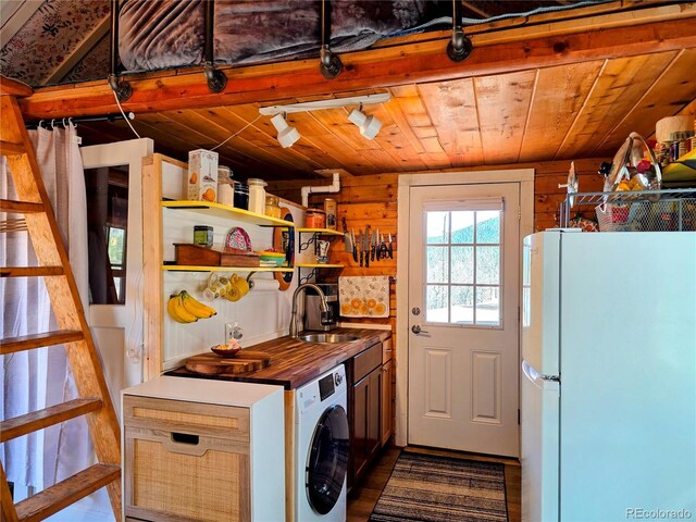 163 Ward St, Bailey, CO 80421 - washroom with laundry area, track lighting, washer / dryer, a sink, and dark wood finished floors