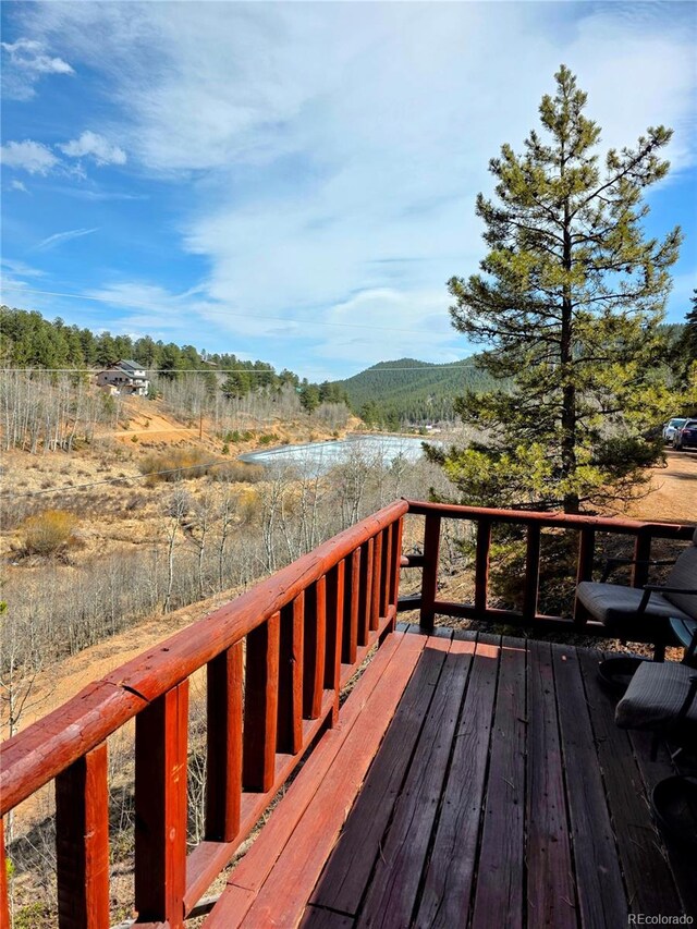 163 Ward St, Bailey, CO 80421 - wooden terrace with a mountain view