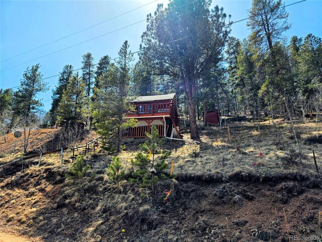 163 Ward St, Bailey, CO 80421 - view of yard with a wooden deck