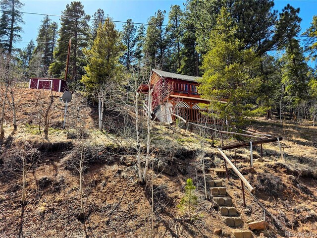 163 Ward St, Bailey, CO 80421 - view of yard with a wooden deck