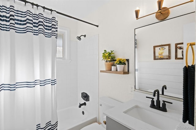 full bathroom featuring vanity, shower / tub combo with curtain, and toilet