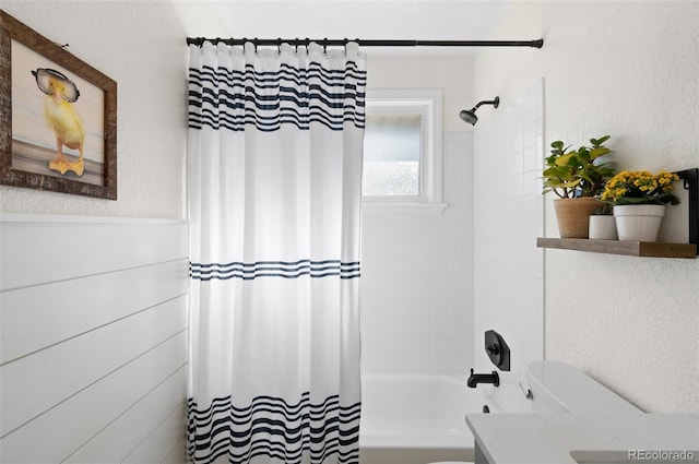 full bathroom with vanity, toilet, and shower / bath combo with shower curtain