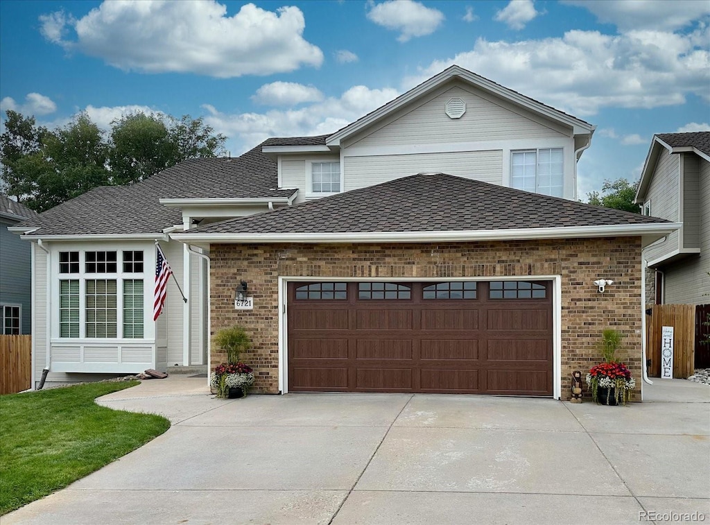 view of front of home with a garage