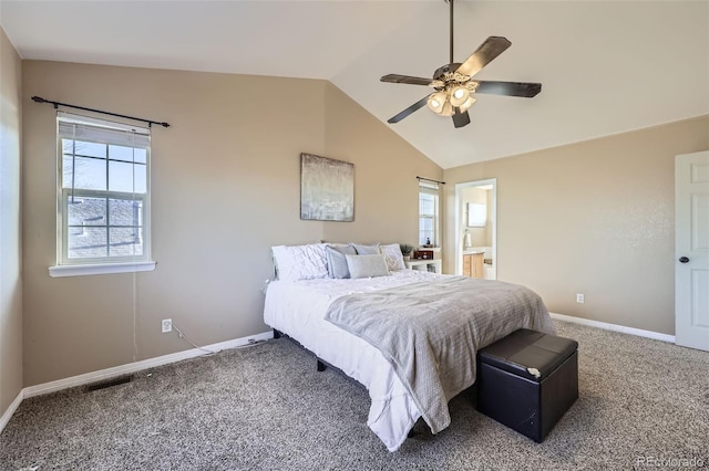 9990 Jasper St, Commerce City, CO 80022 - bedroom with multiple windows, carpet, vaulted ceiling, and baseboards