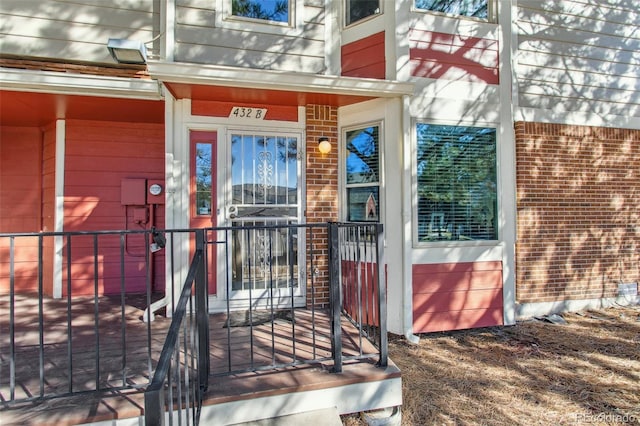 432 W Rockrimmon Blvd Unit B, Colorado Springs, CO 80919 - doorway to property with brick siding