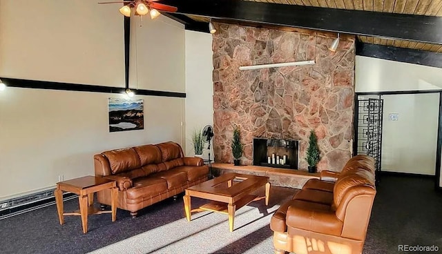 432 W Rockrimmon Blvd Unit B, Colorado Springs, CO 80919 - living room with a ceiling fan, a fireplace, and a wooden ceiling with exposed beams