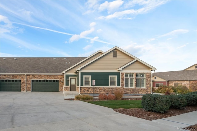 craftsman-style home featuring a garage