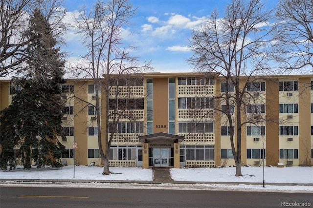 view of snow covered building