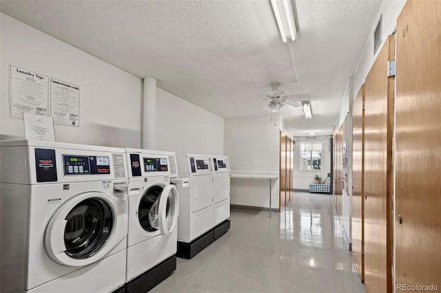 laundry room with ceiling fan, washer and clothes dryer, and a textured ceiling