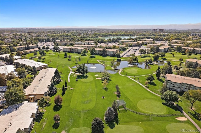 bird's eye view featuring a water view and golf course view