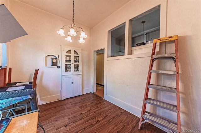 939 Conejos St, Colorado Springs, CO 80903 - dining room with wood finished floors and a chandelier