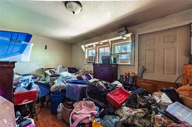 939 Conejos St, Colorado Springs, CO 80903 - miscellaneous room featuring wood finished floors and a textured ceiling