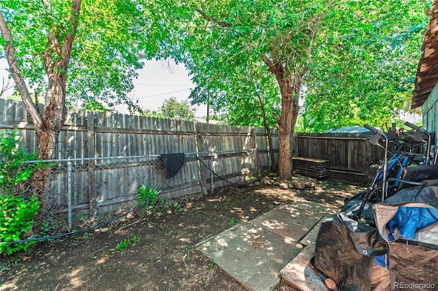 939 Conejos St, Colorado Springs, CO 80903 - fenced backyard with a patio area