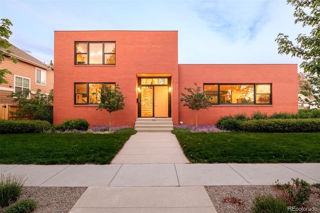 1188 S Sherman St, Denver, CO 80210 - contemporary house with brick siding and a front yard