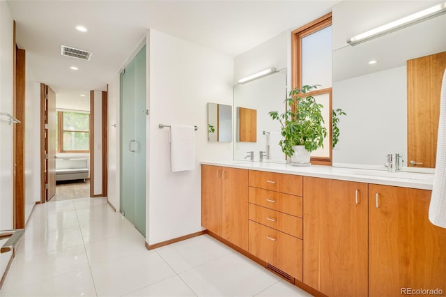 1188 S Sherman St, Denver, CO 80210 - bathroom featuring double vanity, baseboards, a stall shower, and recessed lighting