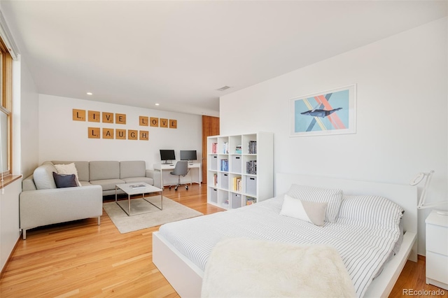 1188 S Sherman St, Denver, CO 80210 - bedroom with light wood finished floors, an office area, and recessed lighting