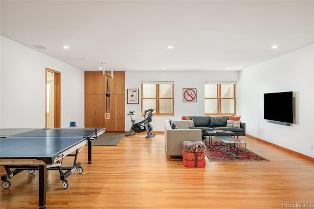1188 S Sherman St, Denver, CO 80210 - game room with light wood finished floors, recessed lighting, and baseboards