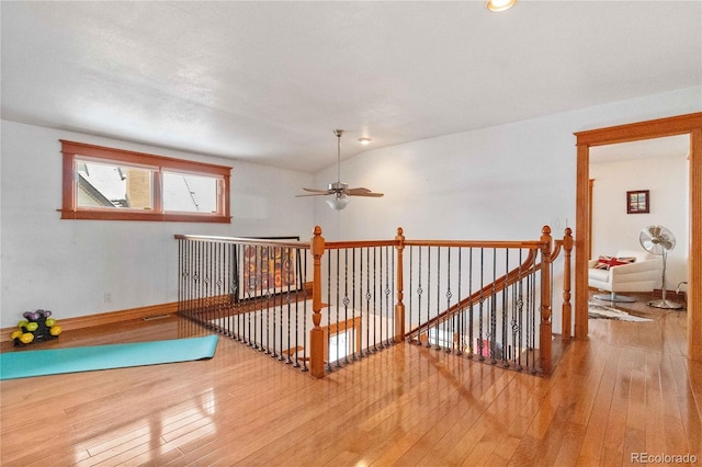bonus room featuring wood-type flooring and ceiling fan
