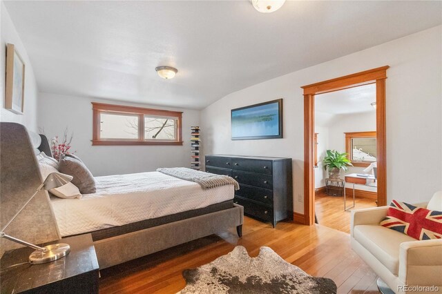 bedroom featuring light wood-style floors