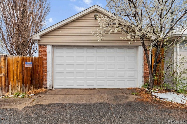 garage featuring fence