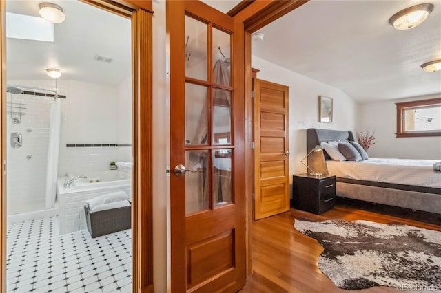 bedroom featuring wood finished floors