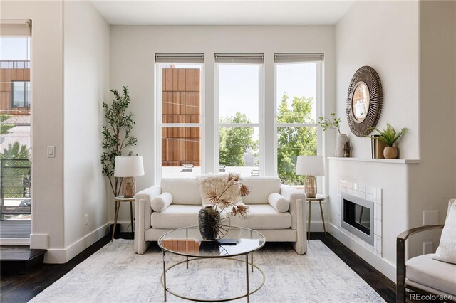 1932 W 32nd Ave, Denver, CO 80211 - living area with wood finished floors and a tiled fireplace