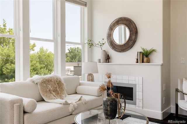 1932 W 32nd Ave, Denver, CO 80211 - living area featuring a fireplace and wood finished floors