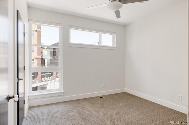 1932 W 32nd Ave, Denver, CO 80211 - carpeted empty room with ceiling fan and baseboards