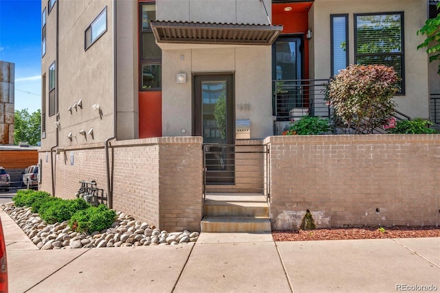 1932 W 32nd Ave, Denver, CO 80211 - view of exterior entry with stucco siding