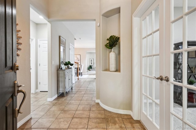 2601 Pemberly Ave, Highlands Ranch, CO 80126 - foyer entrance with baseboards and light tile patterned flooring