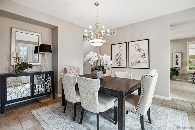 2601 Pemberly Ave, Highlands Ranch, CO 80126 - dining room featuring a chandelier and baseboards