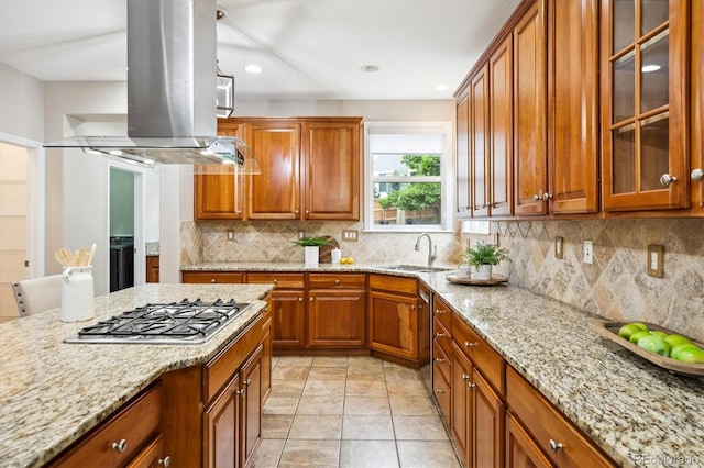 2601 Pemberly Ave, Highlands Ranch, CO 80126 - kitchen featuring a sink, island exhaust hood, brown cabinets, light stone counters, and recessed lighting