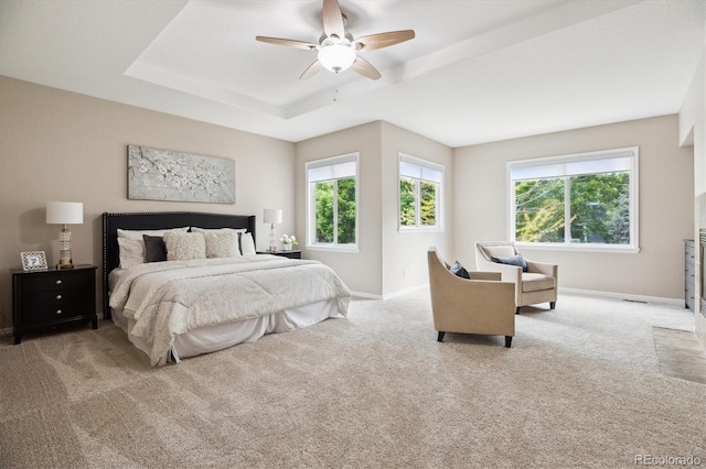 2601 Pemberly Ave, Highlands Ranch, CO 80126 - carpeted bedroom with a raised ceiling, baseboards, and a ceiling fan