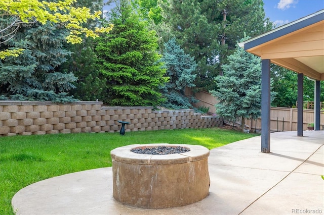2601 Pemberly Ave, Highlands Ranch, CO 80126 - view of patio / terrace featuring a fire pit