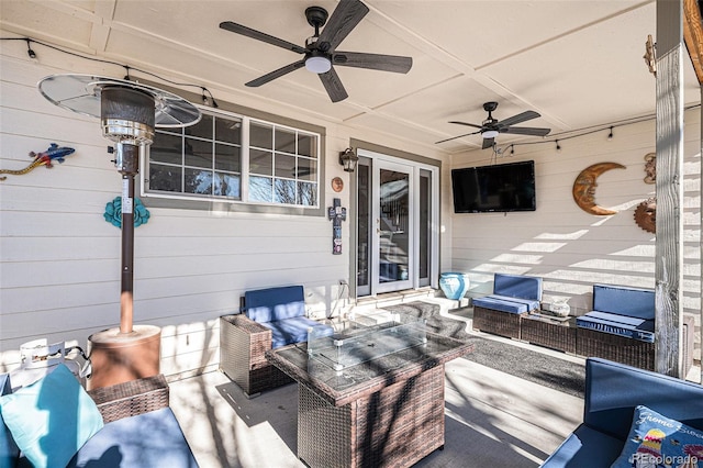 view of patio / terrace with ceiling fan and an outdoor hangout area