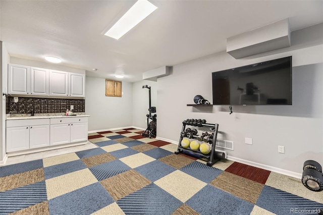 5426 S Jasper Way, Centennial, CO 80015 - workout room with baseboards