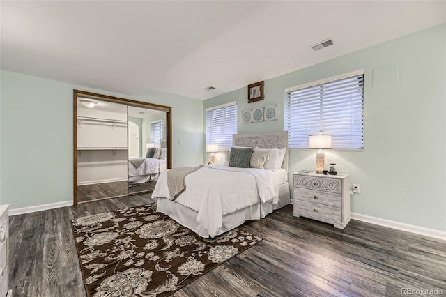 5426 S Jasper Way, Centennial, CO 80015 - bedroom featuring baseboards, wood finished floors, and a closet