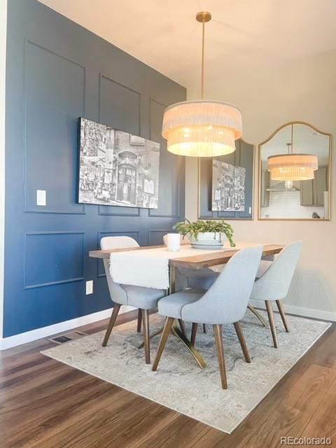 dining area featuring dark hardwood / wood-style flooring