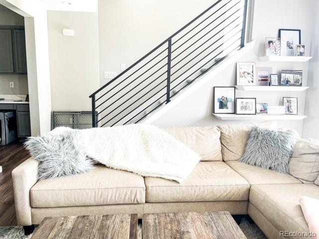 living room with dark hardwood / wood-style floors