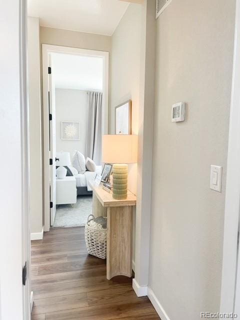 hallway featuring hardwood / wood-style flooring