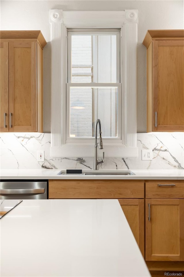 2355 N Emerson St, Denver, CO 80205 - kitchen with a sink, light countertops, and stainless steel dishwasher