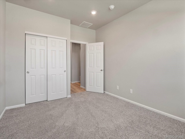 17557 E 89th Way, Commerce City, CO 80022 - unfurnished bedroom with carpet, a closet, and recessed lighting