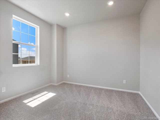 17557 E 89th Way, Commerce City, CO 80022 - carpeted empty room with recessed lighting